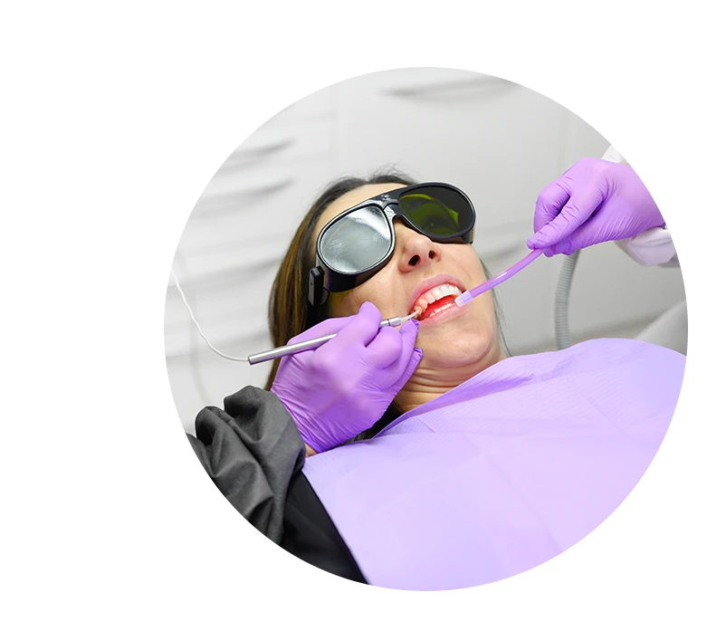 Dentist Using A Modern Diode Dental Laser