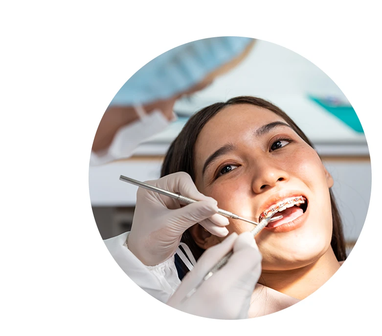 Orthodontist doctor examine tooth to woman patient at dental clinic