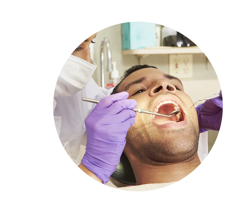 Man Having Check Up At Dentists