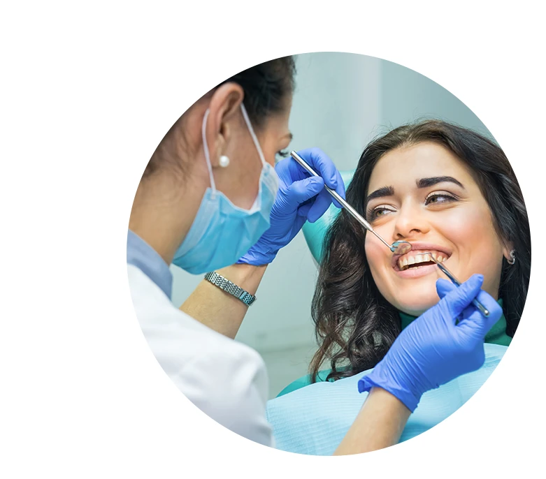 Woman at the dentist smiling.